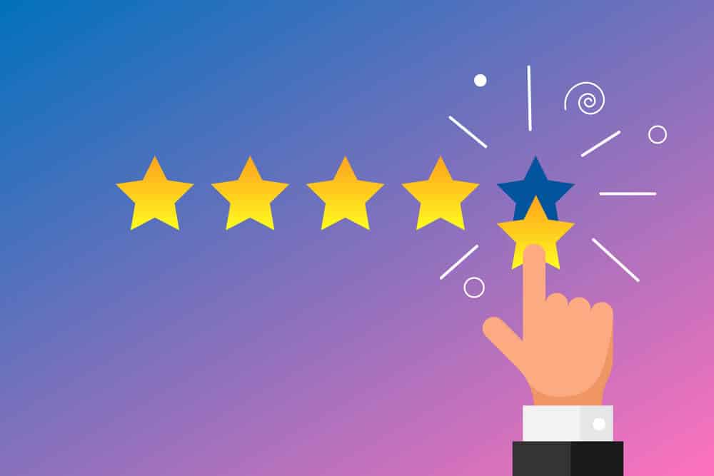 Artwork showing a hand putting stars in a review